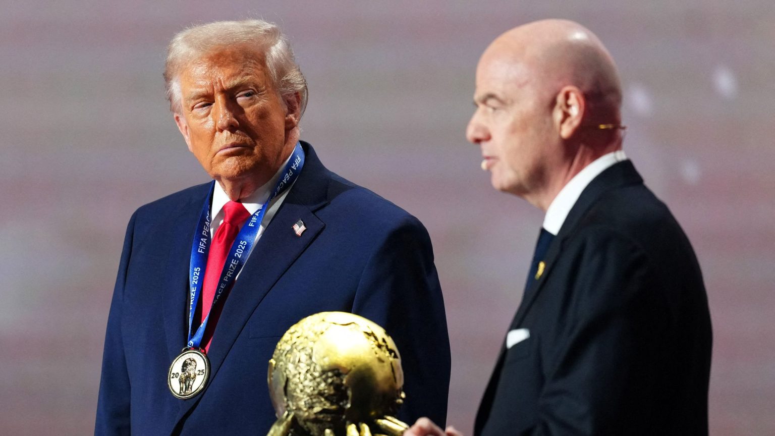 explore the intense rivalry between trump's fifa peace trophy and the world cup, highlighting the clash of global football ambitions and political influence.